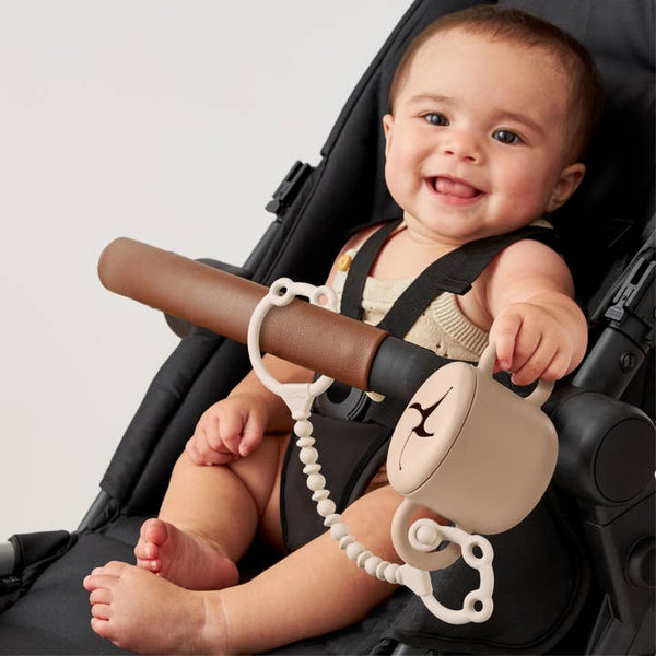 Itzy Strap Pack™ - Toy and Snack Cup Strap - Tan/Cream