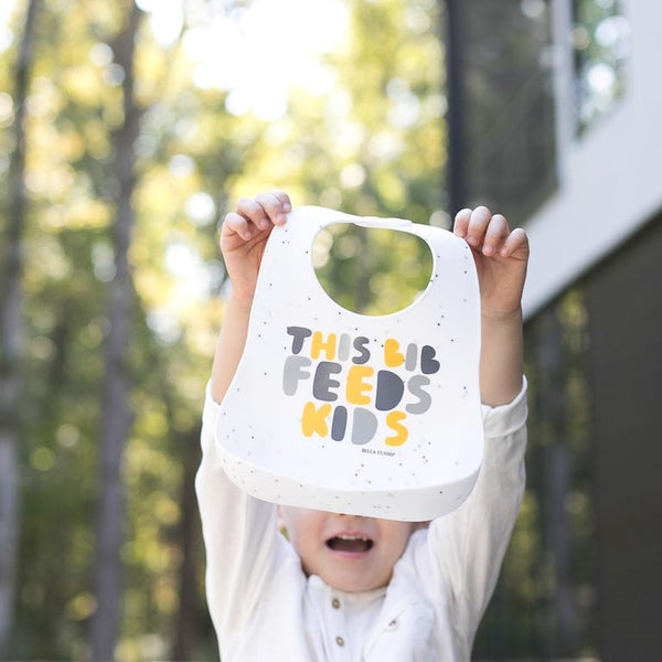 Wonder Bib - This Bib Feeds Kids - Yellow