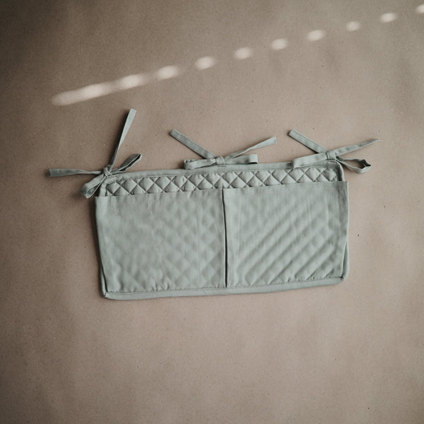 Mushie Crib Pocket- Roman Green